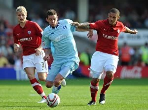Images Dated 1st October 2011: Lucas Jutkiewicz vs. Nathan Doyle: A Championship Battle at Oakwell Stadium - Coventry City vs