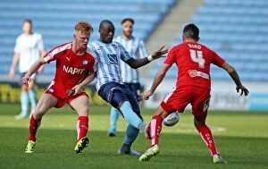 Images Dated 19th September 2015: Marc-Antoine Fortune Battles Past Chesterfield Defenders in Coventry City's Sky Bet League One Match