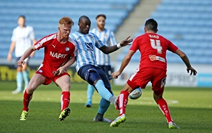 Marc-Antoine Fortune Battles Past Chesterfield Defenders in Coventry City's Sky Bet League One Match