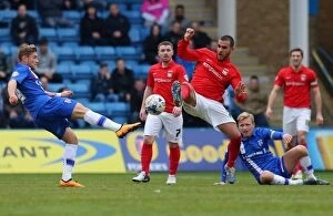 Images Dated 2nd April 2016: Marcus Tudgay vs. George Williams: Intense Clash in Sky Bet League One Match at MEMS Priestfield