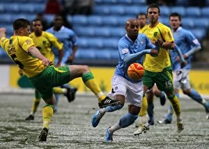 Images Dated 18th December 2010: Marlon King vs Michael Nelson: Intense Tackle in Coventry City vs Norwich City Championship Clash