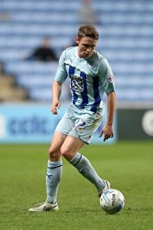 Images Dated 14th April 2015: Matthew Pennington in Action: Coventry City vs Oldham Athletic (Sky Bet League One, Ricoh Arena)