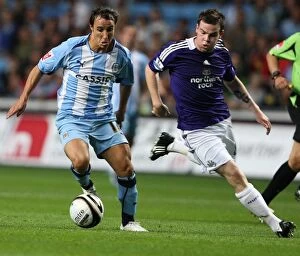 26-08-2008 Round 2 v Newcastle United Collection: Micheal Misfud vs Danny Guthrie: Tussle in the Carling Cup Second Round between Coventry City