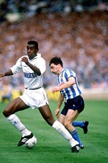 Images Dated 16th May 1987: Mickey Gynn Slips Past Mitchell Thomas at the FA Cup Final: Tottenham Hotspur vs Coventry City