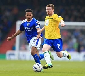 Images Dated 21st April 2014: Midfield Battle: Smith vs. Fleck at Boundary Park - Coventry City vs
