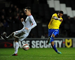 Milton Keynes Dons Shaun Williams Dodges Cyrus Christie's Shot in Npower League One Clash (December 29, 2012)