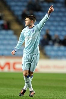 Images Dated 14th February 2012: Npower Championship Showdown: Oliver Norwood of Coventry City vs Leeds United at Ricoh Arena