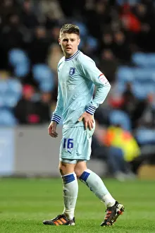 14-02-2012 V Leeds United, Ricoh Arena Prints: Oliver Norwood vs Leeds United: Championship Showdown at Ricoh Arena (14-02-2012)