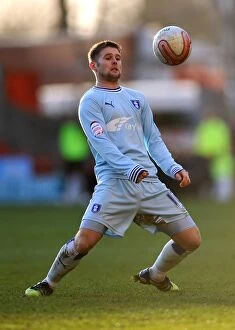 Images Dated 18th February 2012: Oliver Norwood vs. Nottingham Forest: A Fierce Face-Off in the Npower Championship (February 18)