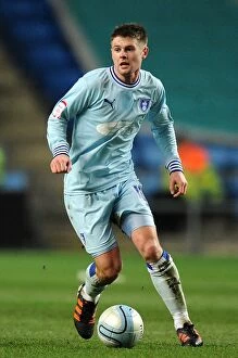 Images Dated 14th February 2012: Oliver Norwood's Thrilling Showdown: Coventry City vs. Leeds United (2012) - Ricoh Arena