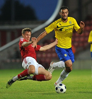 Images Dated 2012 July: Pre-Season Clash: Bruno Constantin Tackled at Wrexham's Racecourse Ground