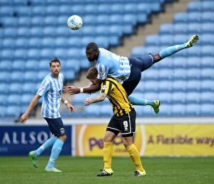 Images Dated 3rd October 2015: Reda Johnson vs. James Collins: A Fierce Rivalry Unfolds in Coventry City vs