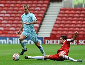 27-08-2011 V Middlesbrough, Riverside Prints: Rhys Williams vs. Carl Baker: Intense Battle at the Riverside - Coventry City vs