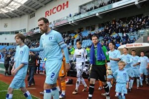 Images Dated 10th December 2011: Richard Keogh Leads Coventry City in Championship Match against Hull City at Ricoh Arena
