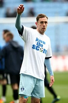 Images Dated 7th April 2012: Richard Keogh's Pre-Match Warm-Up with Know the Score T-Shirt (Coventry City vs)