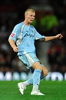 Images Dated 26th September 2007: Robbie Simpson vs Manchester United: Coventry City's Brave Stand at Old Trafford - Carling Cup