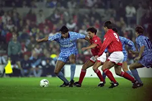 Images Dated 2010 October: Robert Rosario of Coventry City Holds Off Nottingham Forest Defenders in Premier League Clash at City Ground