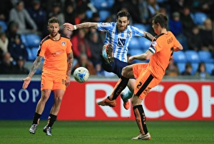 Romain Vincelot vs Owen Garvan: Intense Battle for the Ball in Coventry City vs Colchester United, Sky Bet League One, Ricoh Arena