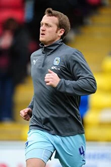 17-03-2012 v Watford, Vicarage Road Collection: Sammy Clingan in Action: Coventry City vs. Watford (March 17, 2012)