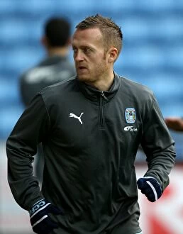 Images Dated 21st January 2012: Sammy Clingan vs Middlesbrough: Npower Championship Showdown at Ricoh Arena (21-01-2012)