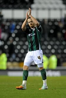 Images Dated 14th January 2012: Sammy Clingan's Heartfelt Applause: A Bittersweet End to Coventry City's Derby County Championship