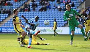 Images Dated 11th April 2015: Sanmi Odelusi's Thrilling Shot: Coventry City vs Colchester United (Sky Bet League One, Ricoh Arena)