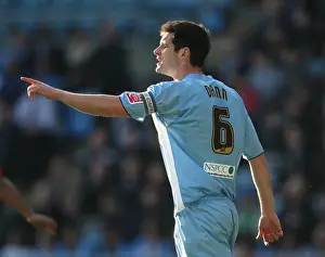 Images Dated 2009 February: Scott Dann of Coventry City vs Birmingham City in Coventry City Football Club's Coca-Cola Football League