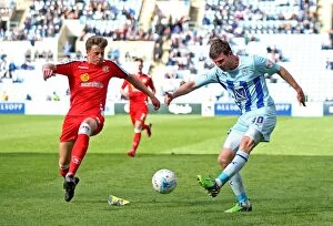 Images Dated 25th April 2015: Showdown at Ricoh Arena: A Battle Between Chris Stokes and James Jones (Sky Bet League One)