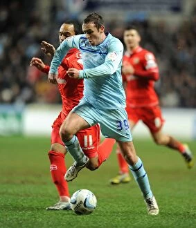 Images Dated 5th February 2013: Showdown at Ricoh Arena: Blair Adams vs Byron Moore in the Johnstones Paint Trophy Final