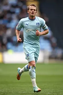 Images Dated 2012 April: Showdown at Ricoh Arena: Sammy Clingan Leads Coventry City Against Peterborough United (Npower Championship)