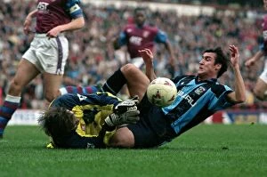 Images Dated 14th February 1998: Sliding for the Upset: Viorel Moldovan's FA Cup Goal Against Aston Villa