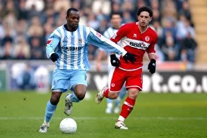 Images Dated 28th January 2006: Stern John Surges Past Fabio Rochemback: Coventry City vs. Middlesbrough in FA Cup Fourth Round