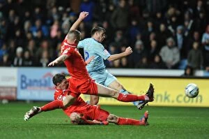 Images Dated 5th February 2013: Steven Jennings Goal Attempt vs Adam Dugdale: Coventry City's Dramatic Moment in the Johnstones