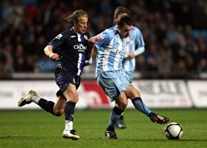 Images Dated 24th February 2009: Tense FA Cup Showdown: Michael Doyle vs. Tugay Kerimoglu