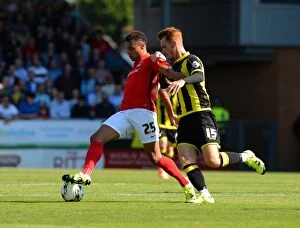 Images Dated 6th September 2015: Tom Naylor vs Jacob Murphy: Intense Tackle in Sky Bet League One Clash Between Burton Albion