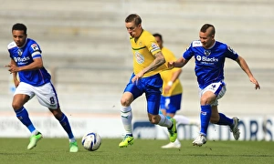 Images Dated 2014 April: Wesolowski vs. Baker: A Rivalry Ignited in Oldham Athletic vs