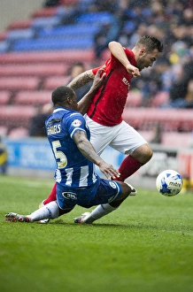 Wigan Athletic vs Coventry City: Intense Battle at DW Stadium - Donervon Daniels vs Adam Armstrong