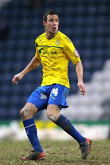 Images Dated 2013 January: Wood vs. Wood: Intense Rivalry in Npower Football League One Clash at Deepdale (January 26)